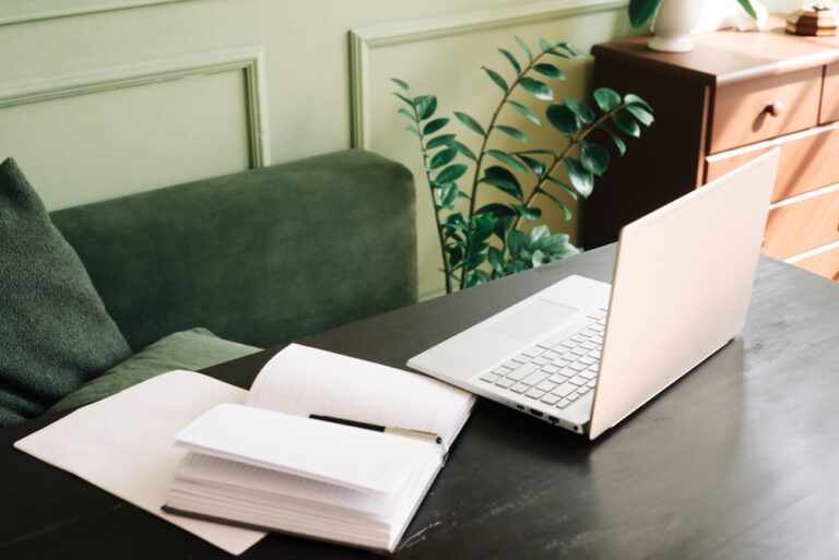 laptop-green-room-plants-clean-journal